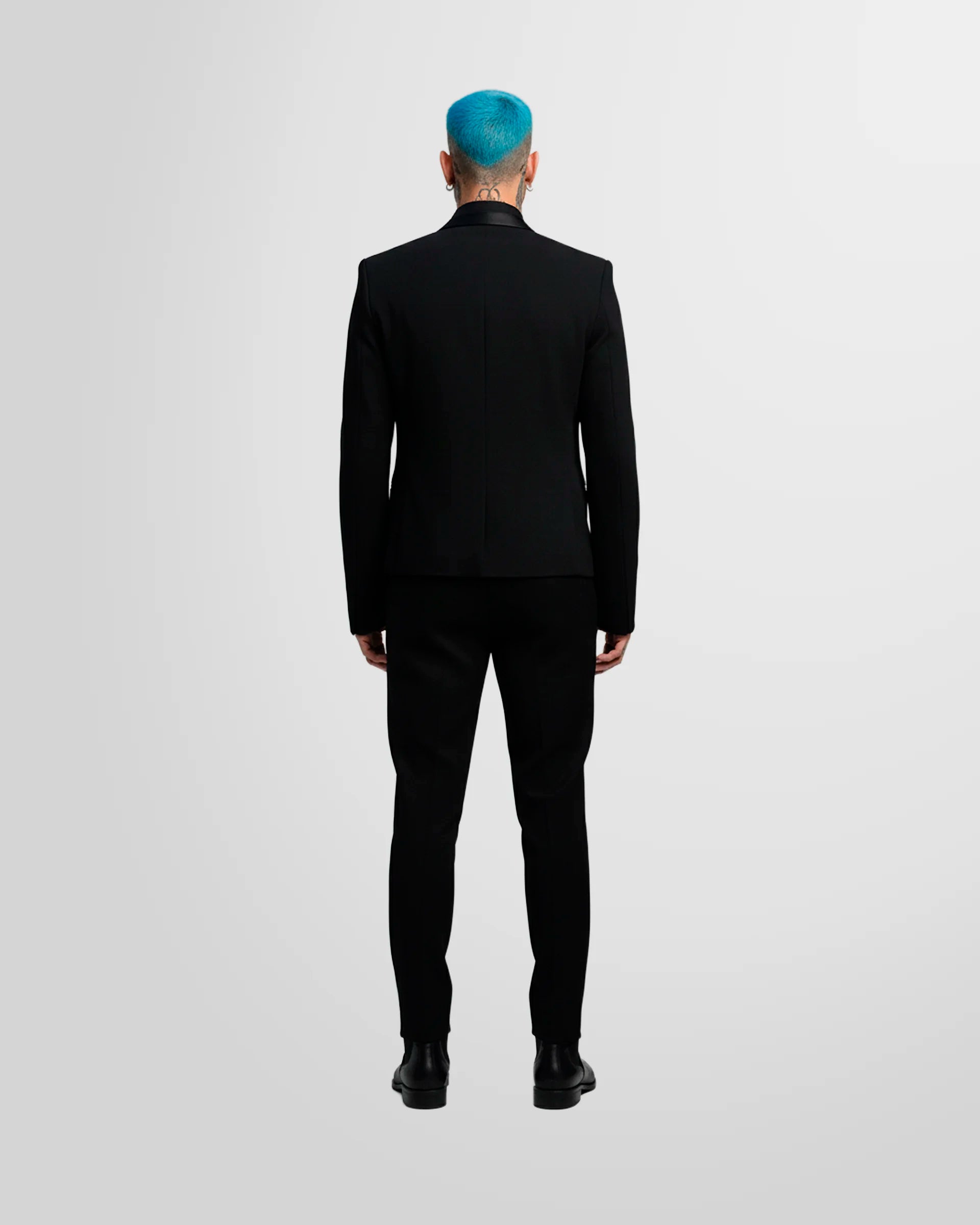 Model wearing the Not Guilty Homme blazer, back view.