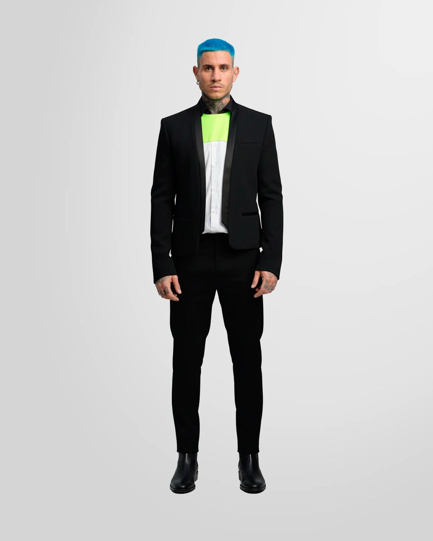 Model wearing the Not Guilty Homme blazer, showcasing its straight fit, cropped length, and open-front styling.