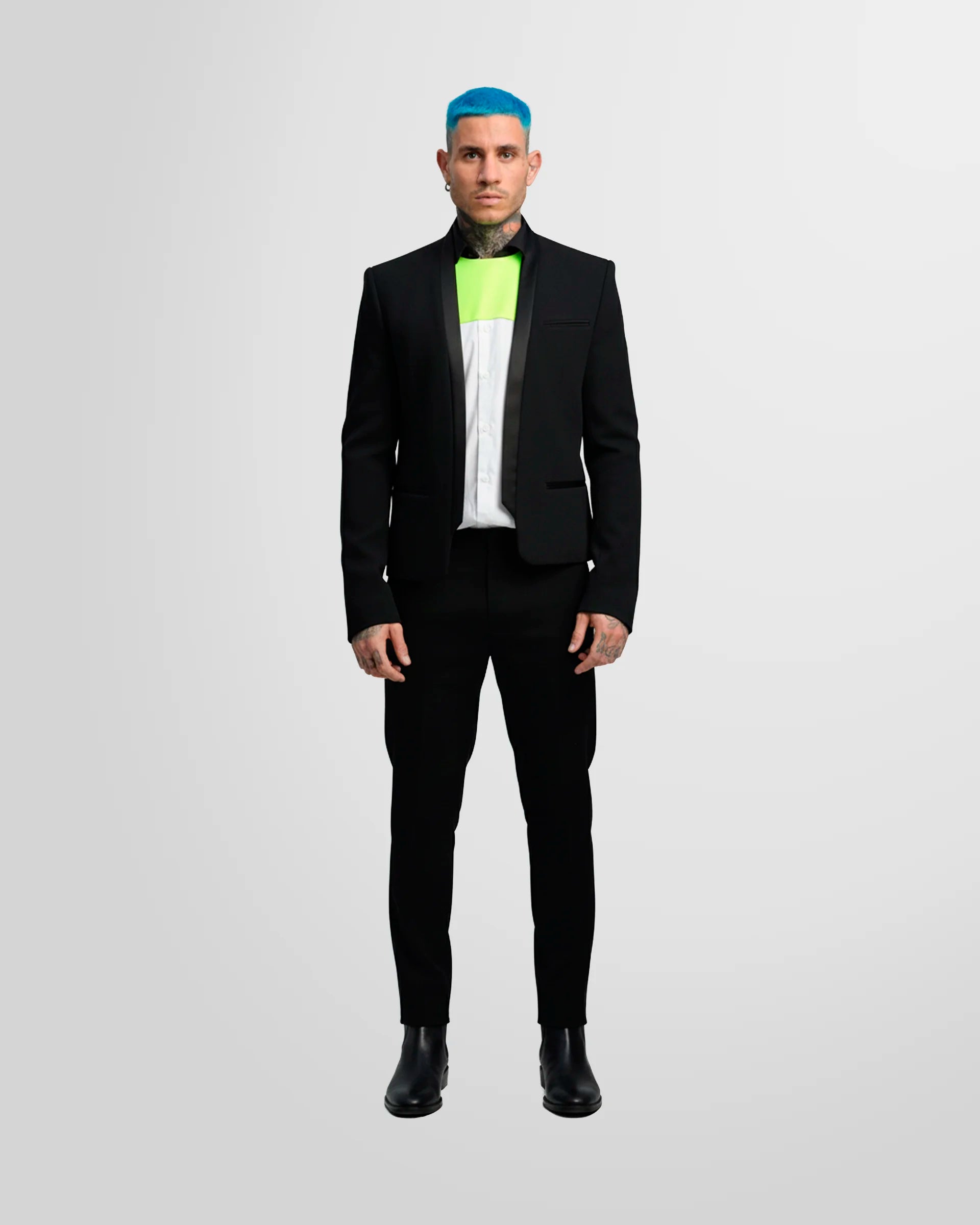 Model wearing the Not Guilty Homme blazer, showcasing its straight fit, cropped length, and open-front styling.