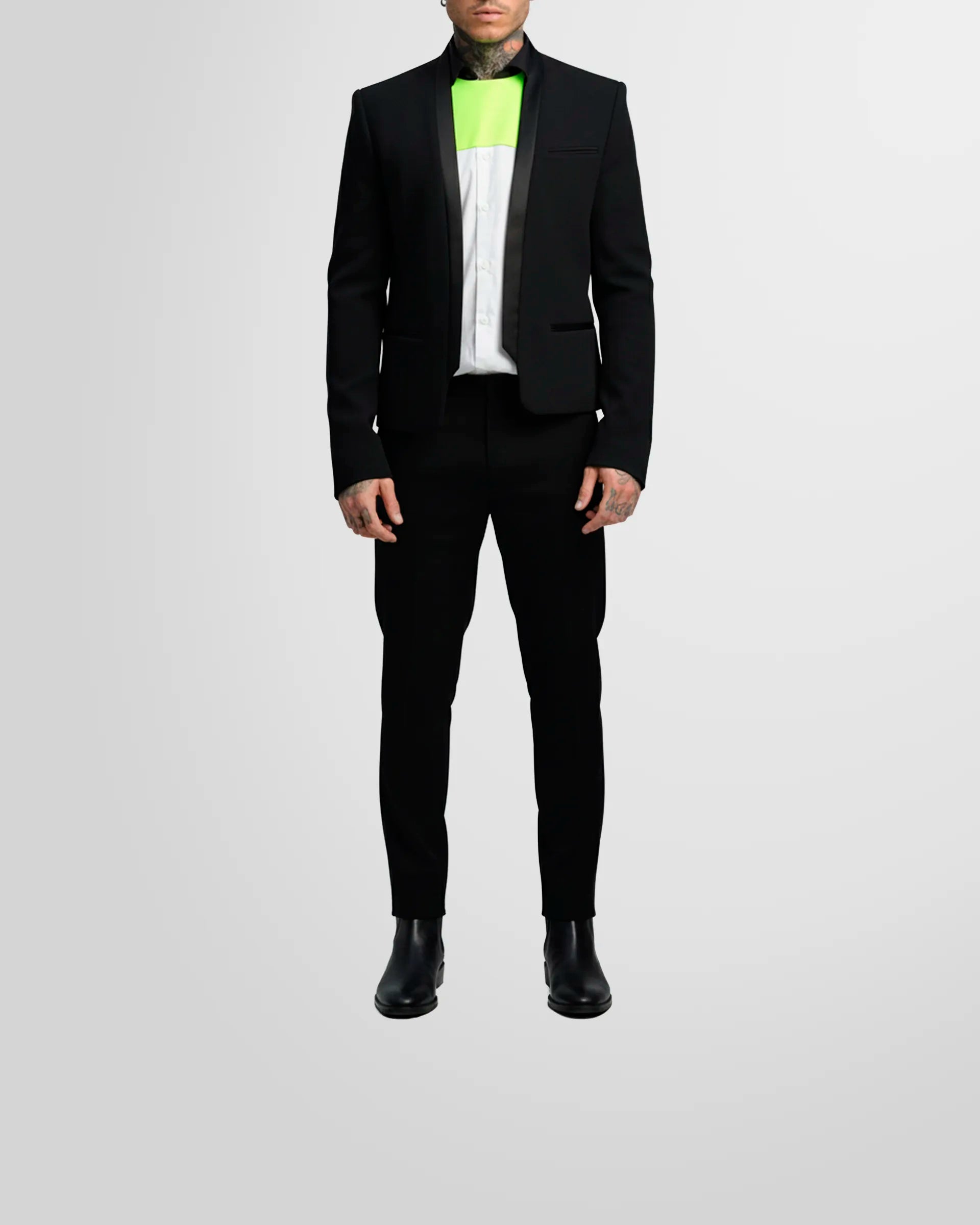 Model wearing the Not Guilty Homme blazer, showcasing its straight fit, cropped length, and open-front styling.