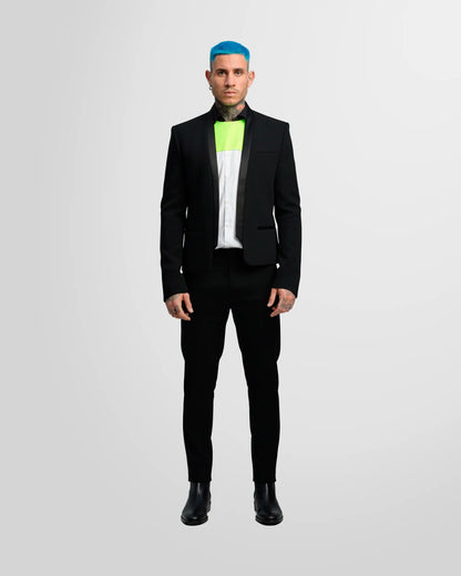 Model wearing the Not Guilty Homme blazer, showcasing its straight fit, cropped length, and open-front styling.