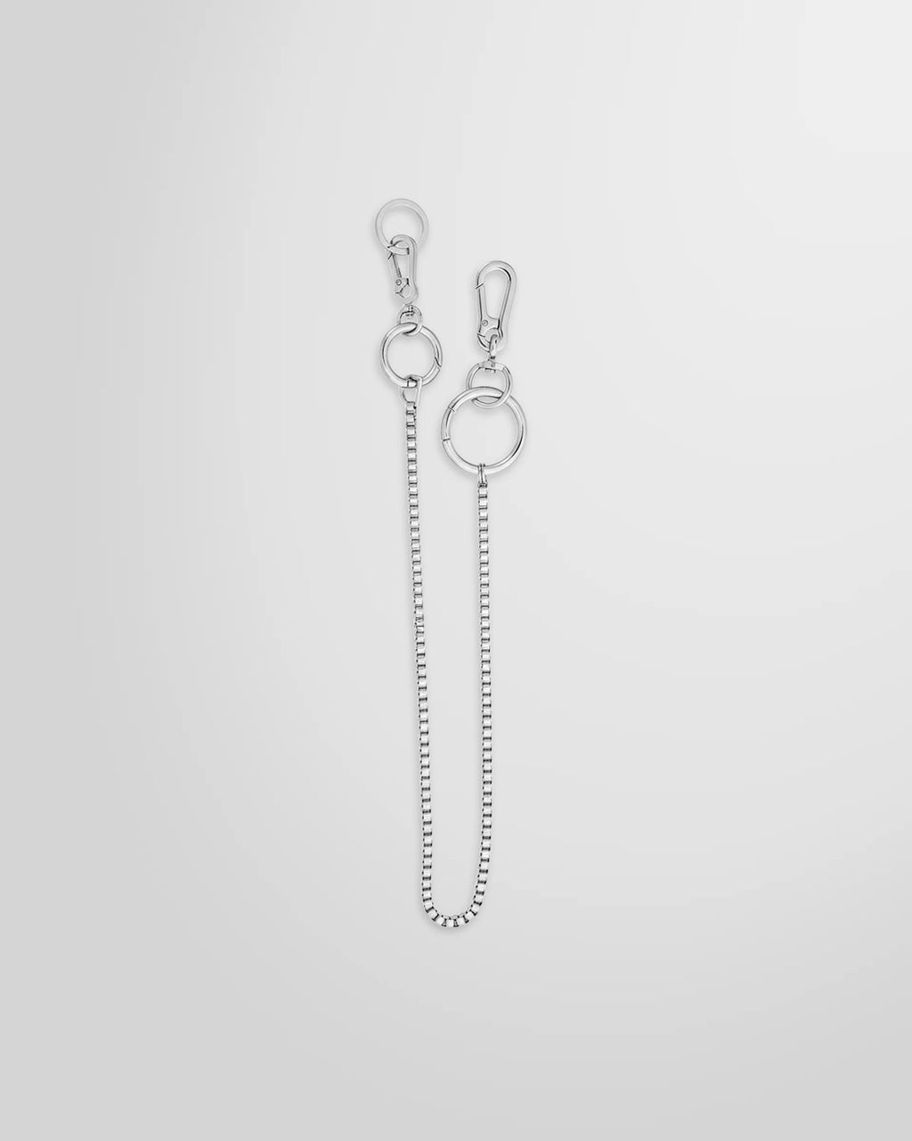Not Guilty Homme silver utility Box Chain accessory with dual carabiner clasps.