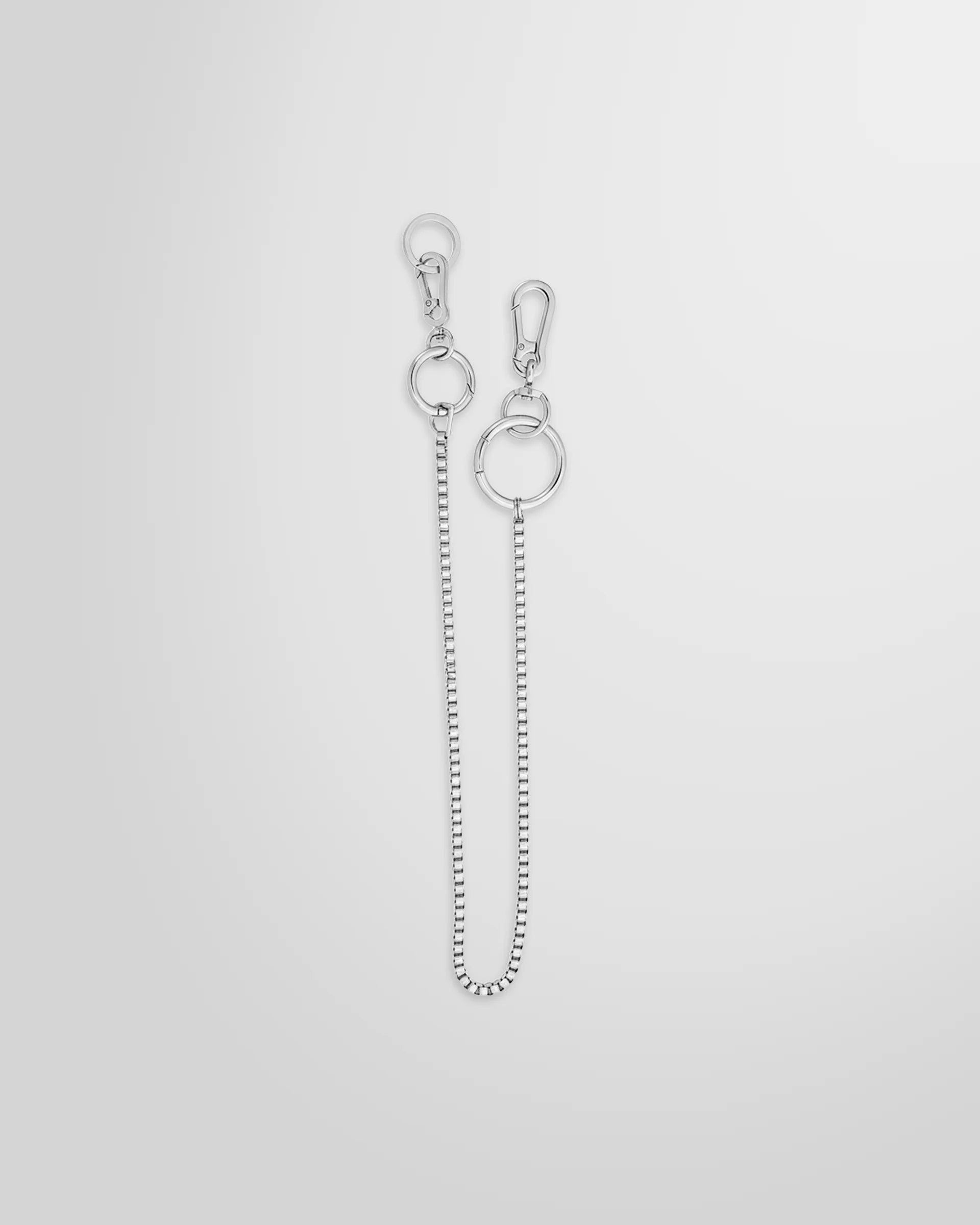 Not Guilty Homme silver utility Box Chain accessory with dual carabiner clasps.