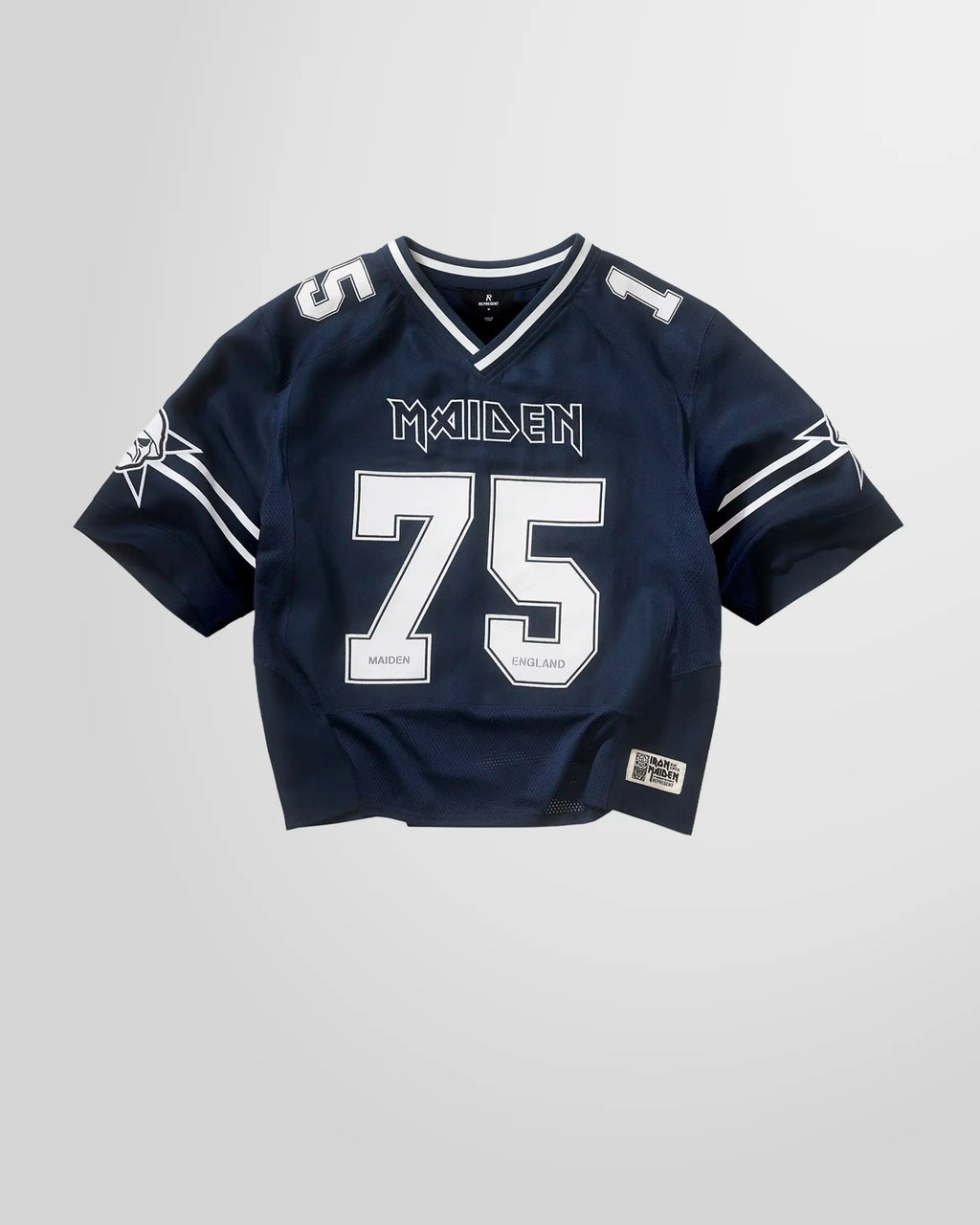 Front view of the Represent x Iron Maiden Anniversary Jersey in mid blue, showing the main graphics and applique numbers.
