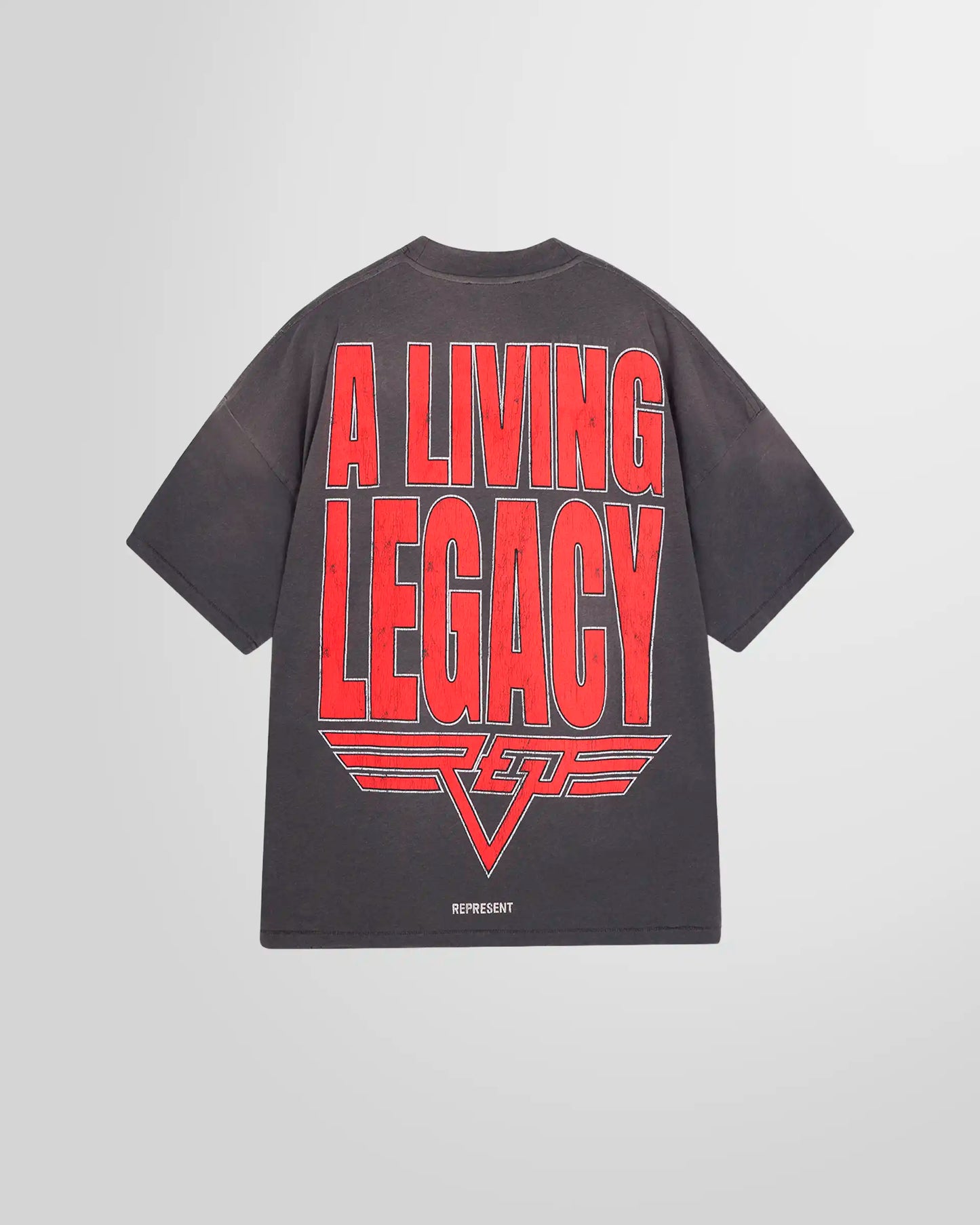 Back view showing the mixed print on the reverse side of the reversible tee in Sun Fade Grey.