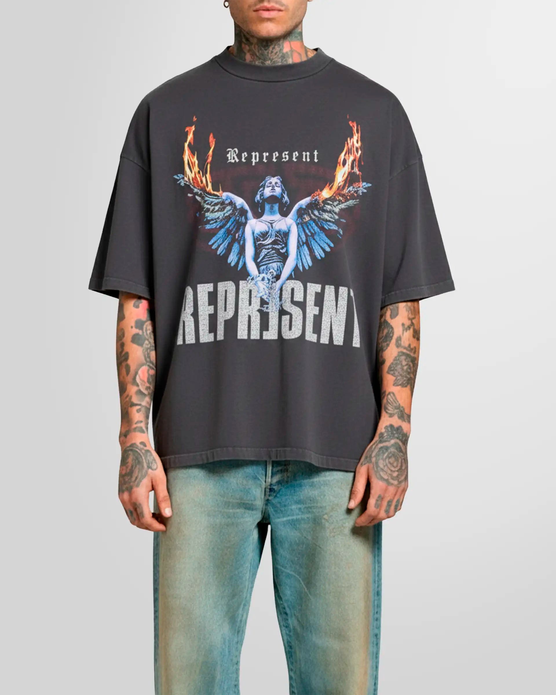 Inside front view of the Represent Reversible Living Legacy Tour T‑Shirt in sun fade grey on a model