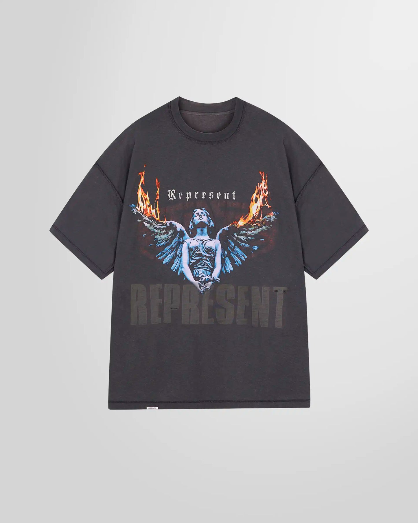 Front inside view showing the mixed print  of the reversible tee in Sun Fade Grey.