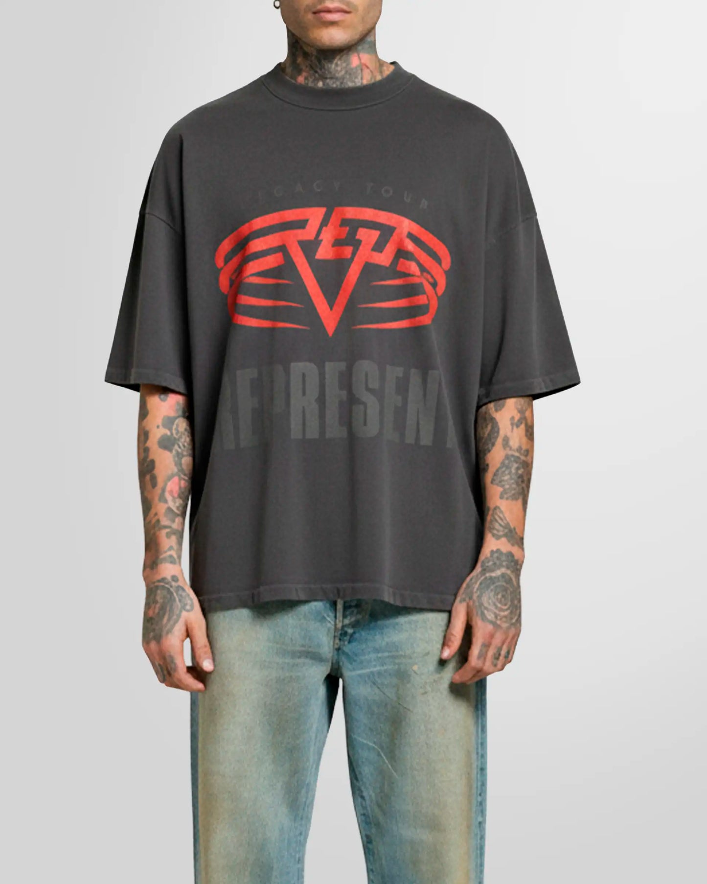 Model wearing the Sun Fade Grey reversible tee, front view, oversized fit.