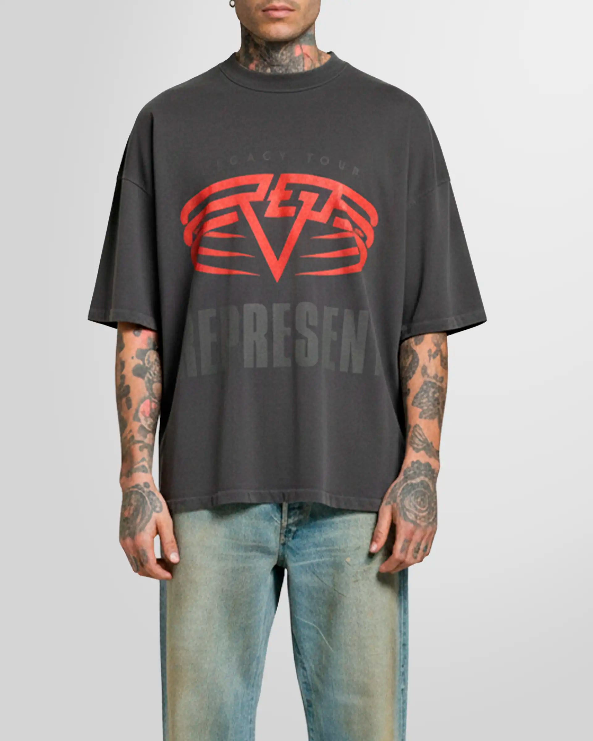 Model wearing the Sun Fade Grey reversible tee, front view, oversized fit.