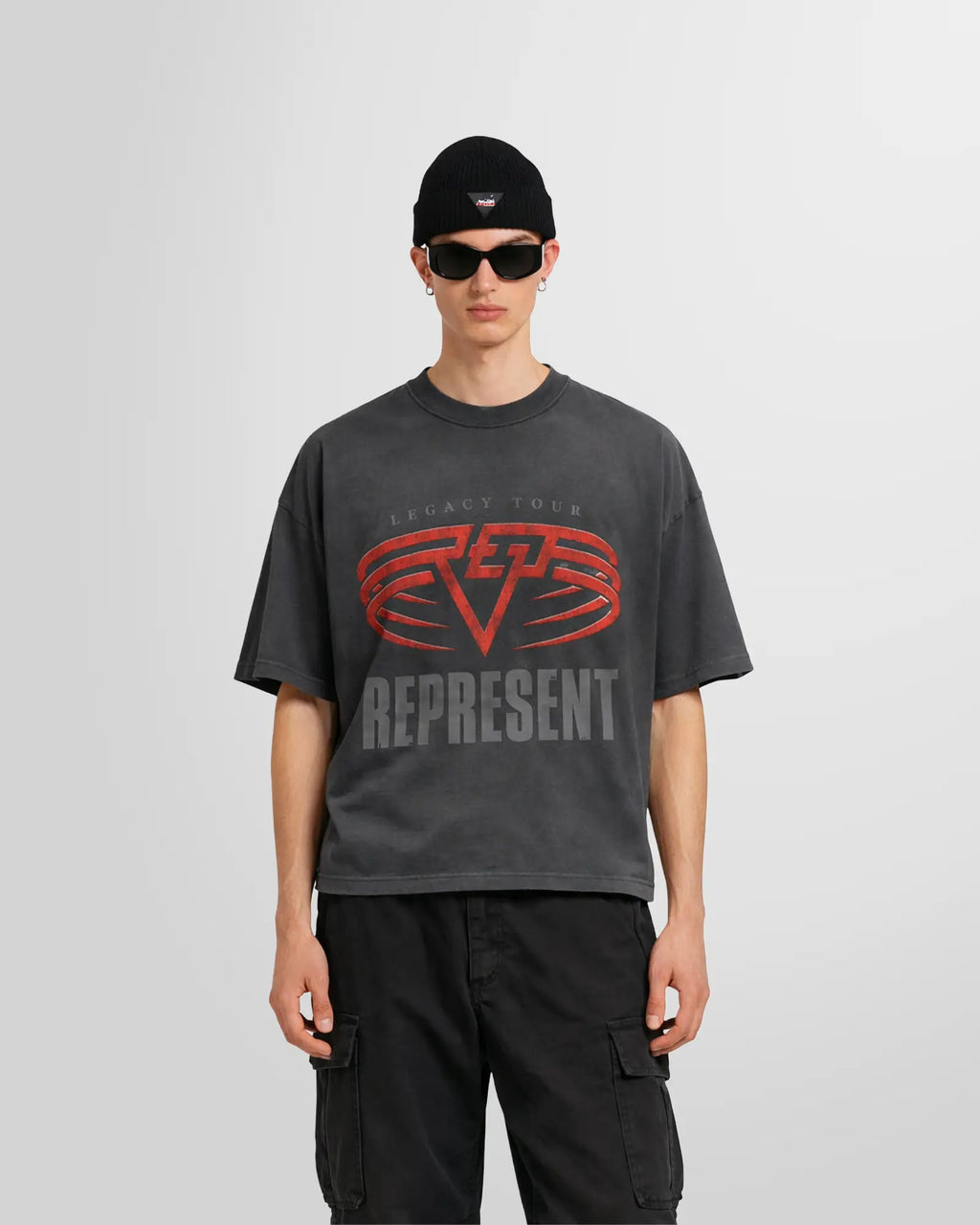 Model wearing the Sun Fade Grey reversible tee, front view, oversized fit.