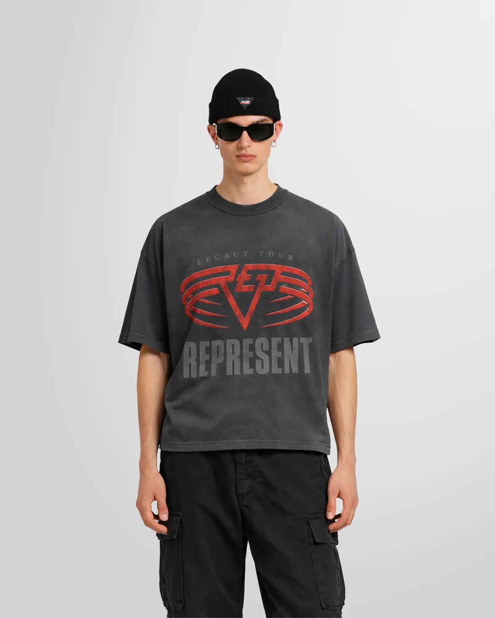 Model wearing the Sun Fade Grey reversible tee, front view, oversized fit.