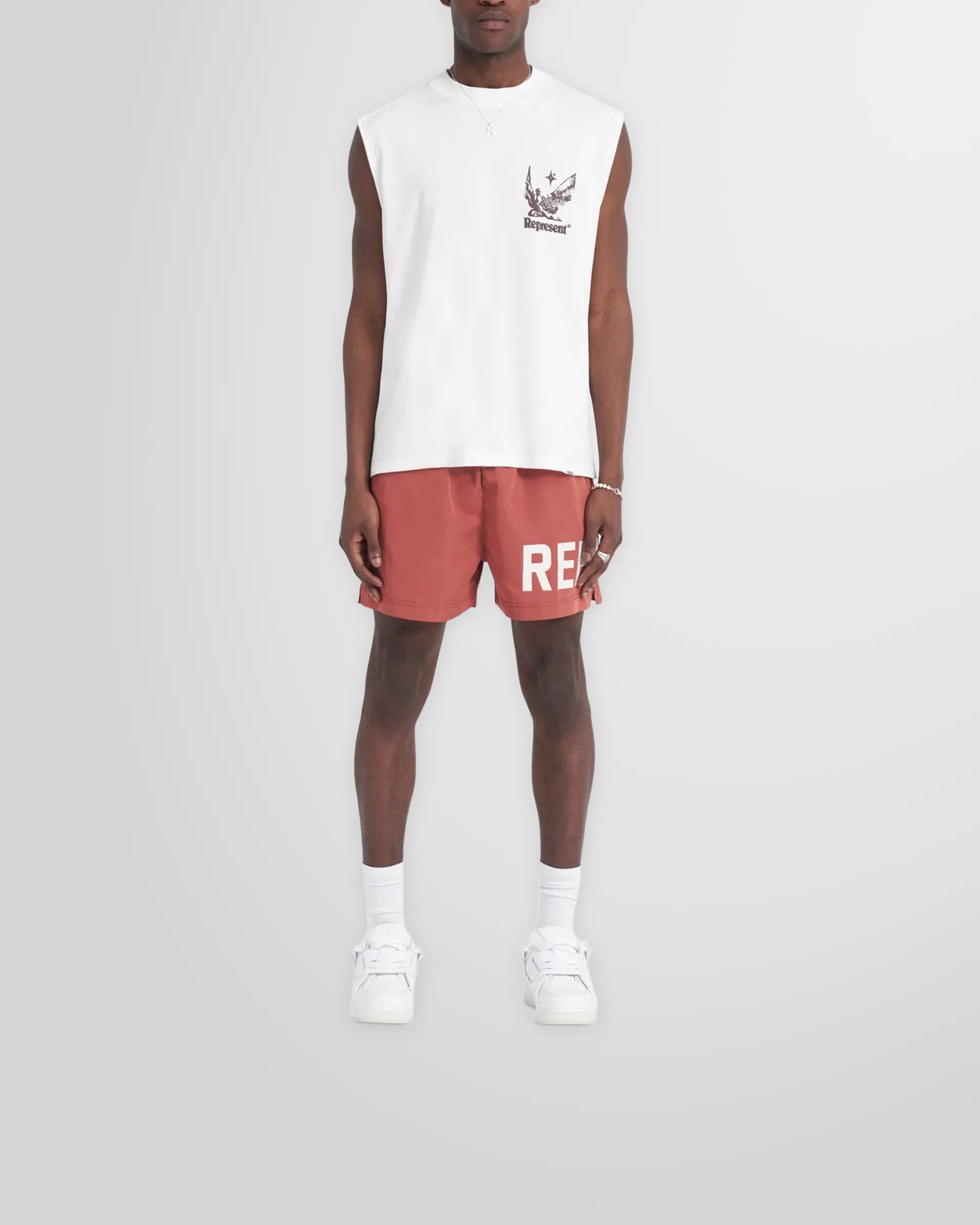 Model wearing the white Represent Spirit Of Summer graphic tank.