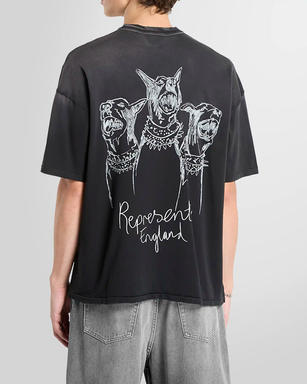 Model wearing the tee, back view highlighting the rear Thoroughbred print.