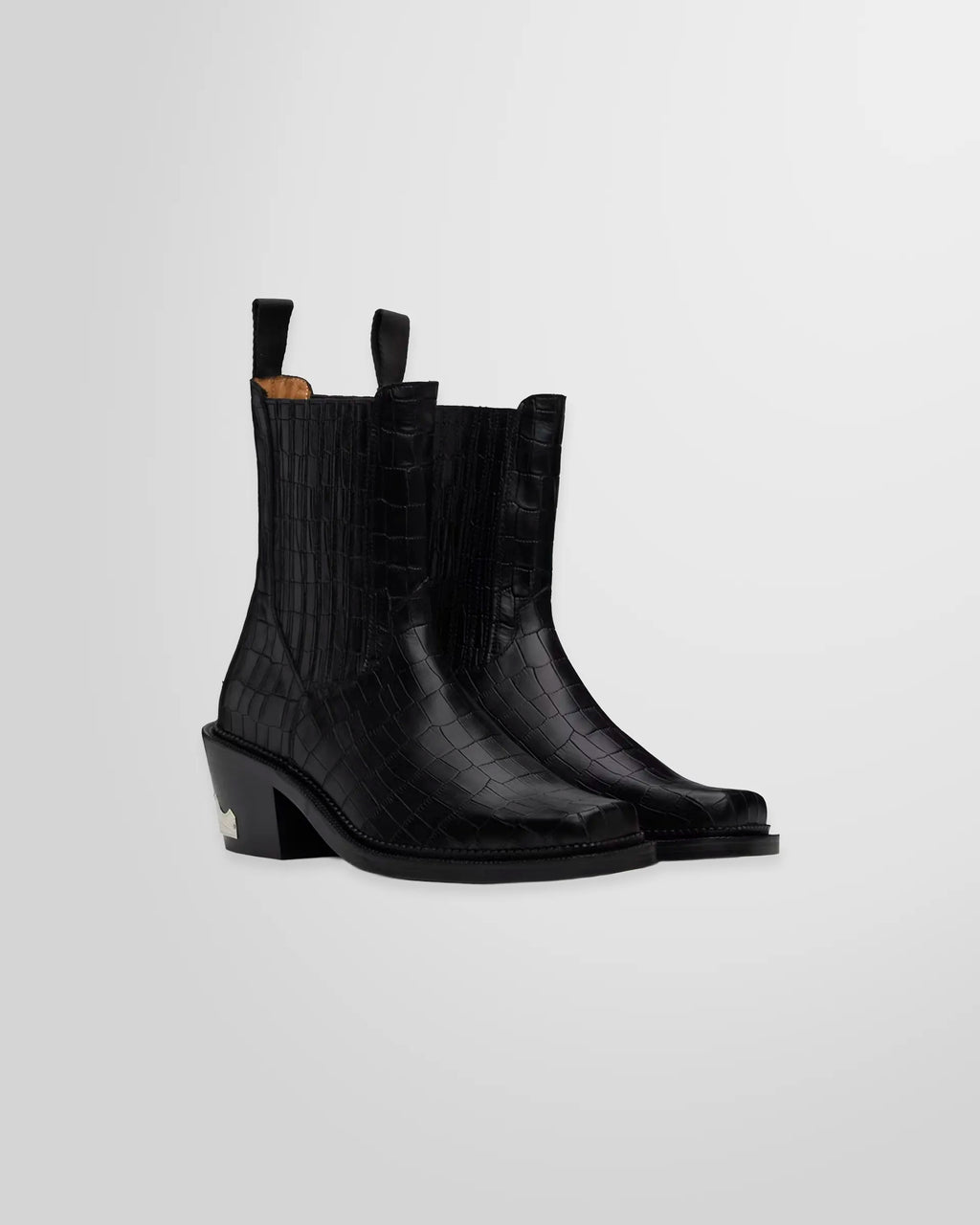 Front view of the Toga Virilis black croc-embossed Chelsea boots, highlighting the pointed square toe.