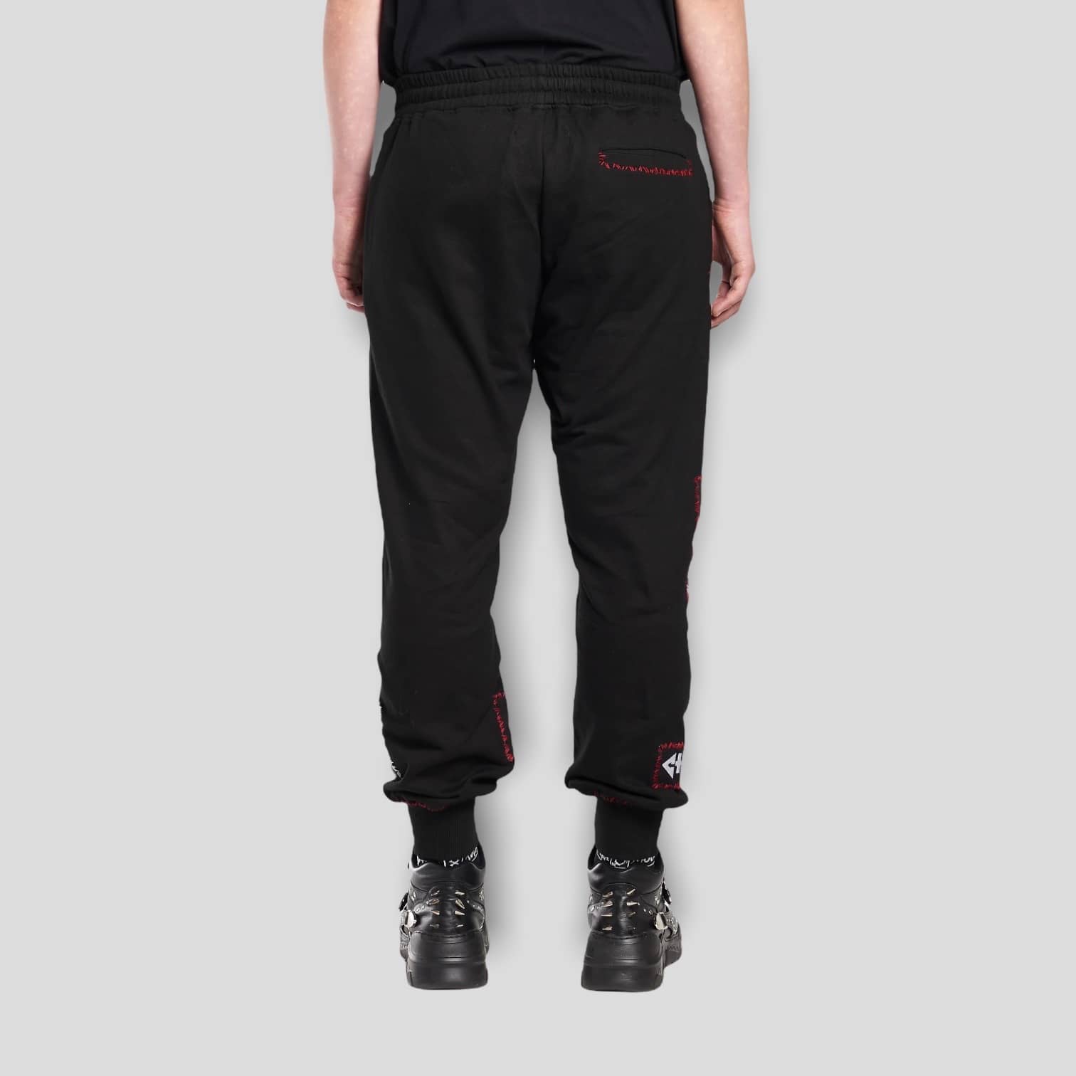 Back view of the black KTZ Multi-Patch Track Pants.
