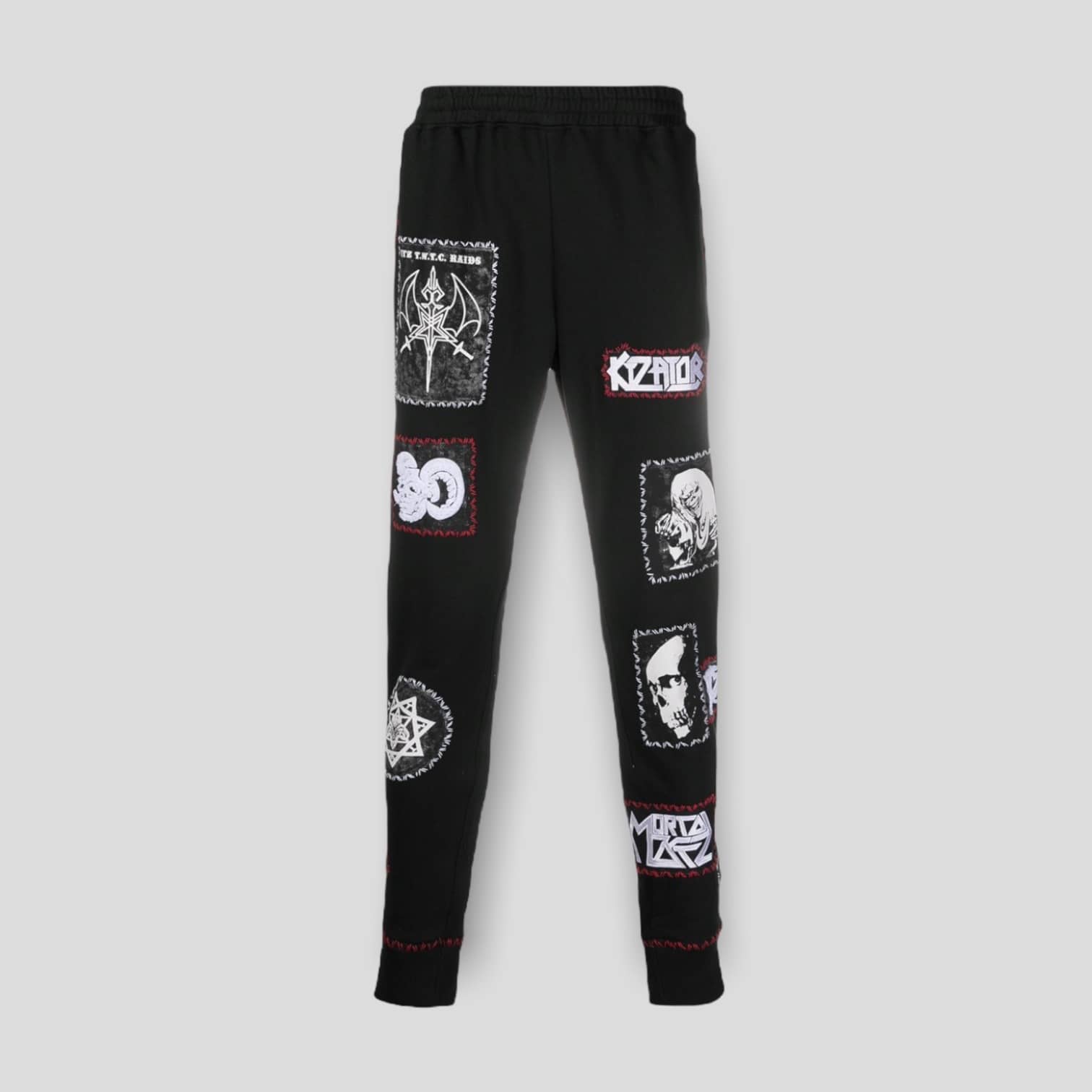Front view of the KTZ Stitched Multi-Patch Track Pants in black, showing the collage of logo patches.